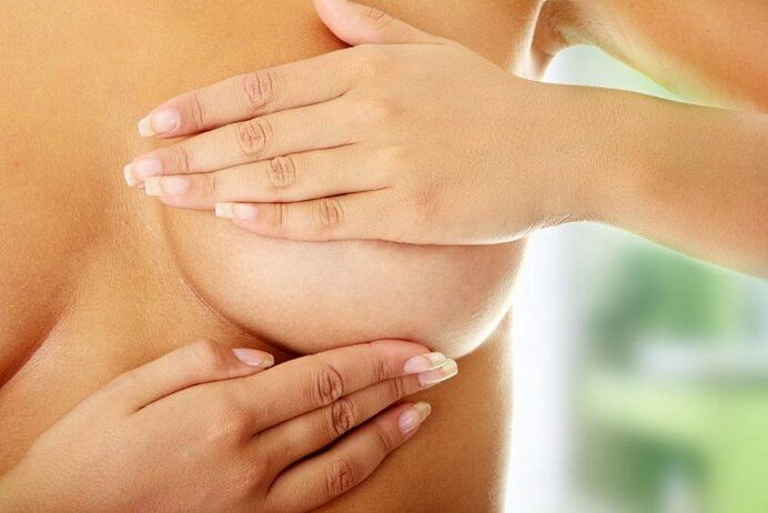 frotar aceite en los senos para agrandarlos